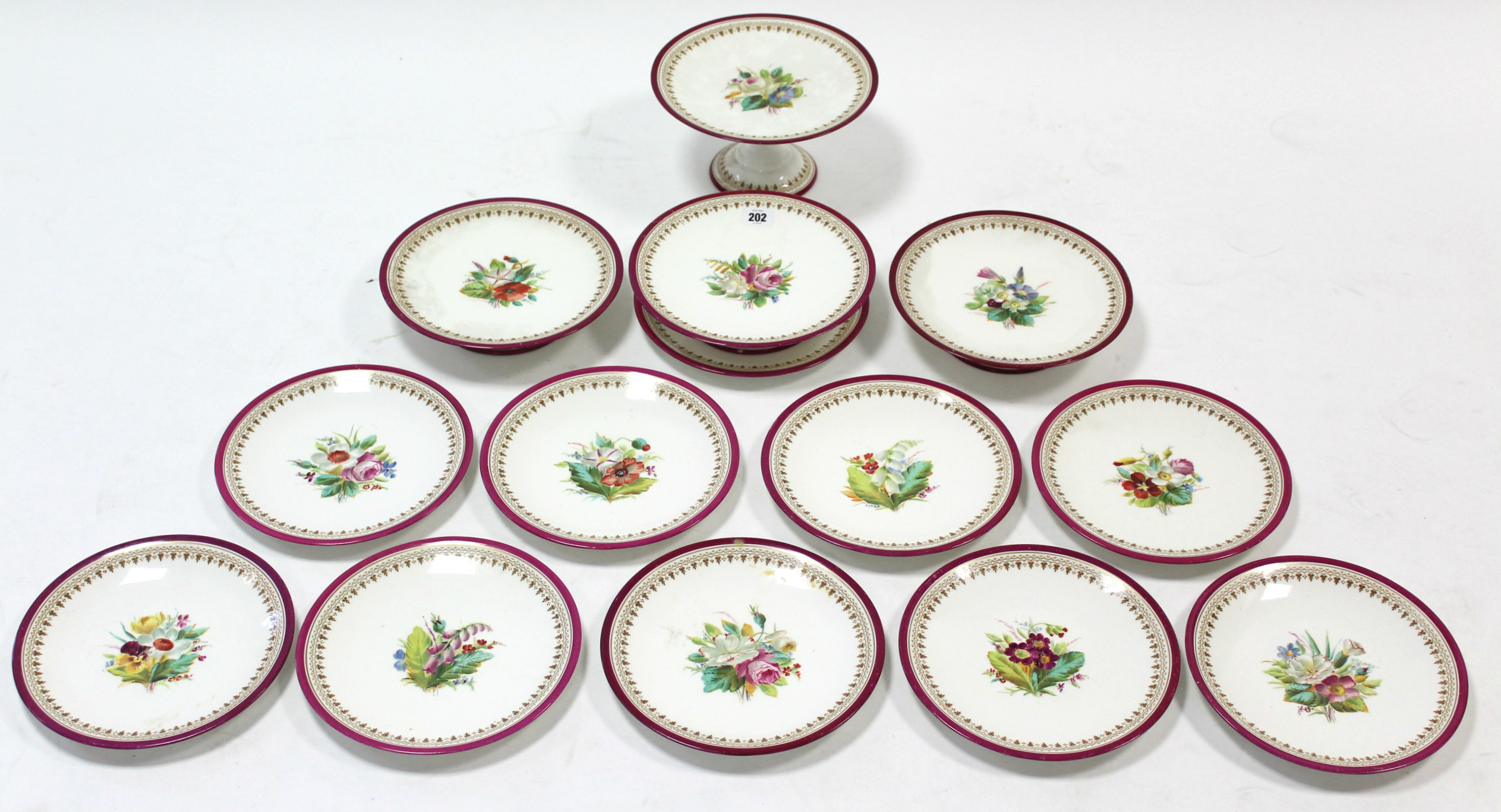 A Victorian porcelain fourteen-piece part dessert service, each piece with different floral design