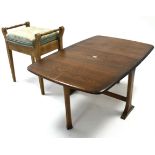 A dark elm drop-leaf occasional table, 41” x 27”; & a box-seat piano stool.