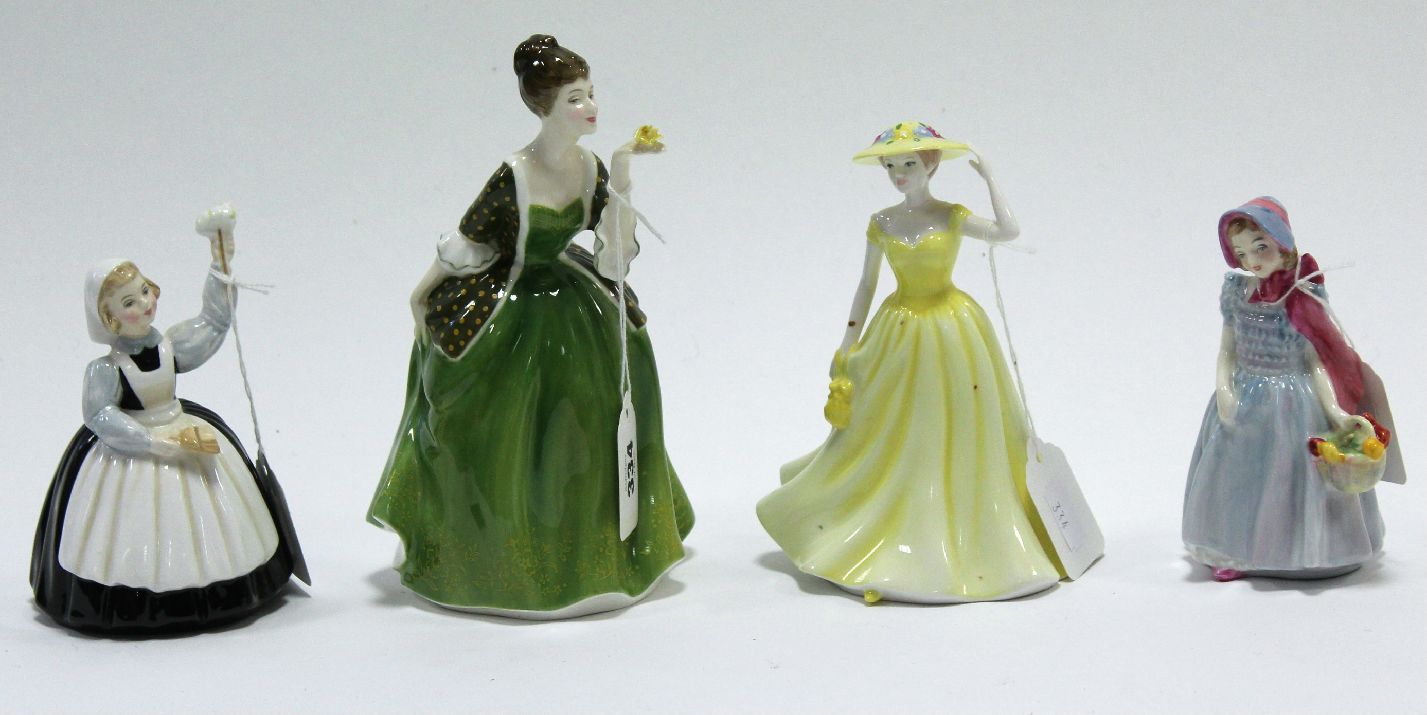 Four Royal Doulton figures “Fleur” (HN 2368); “Mothers Help” (HN 2151); “Spring Time” (HN