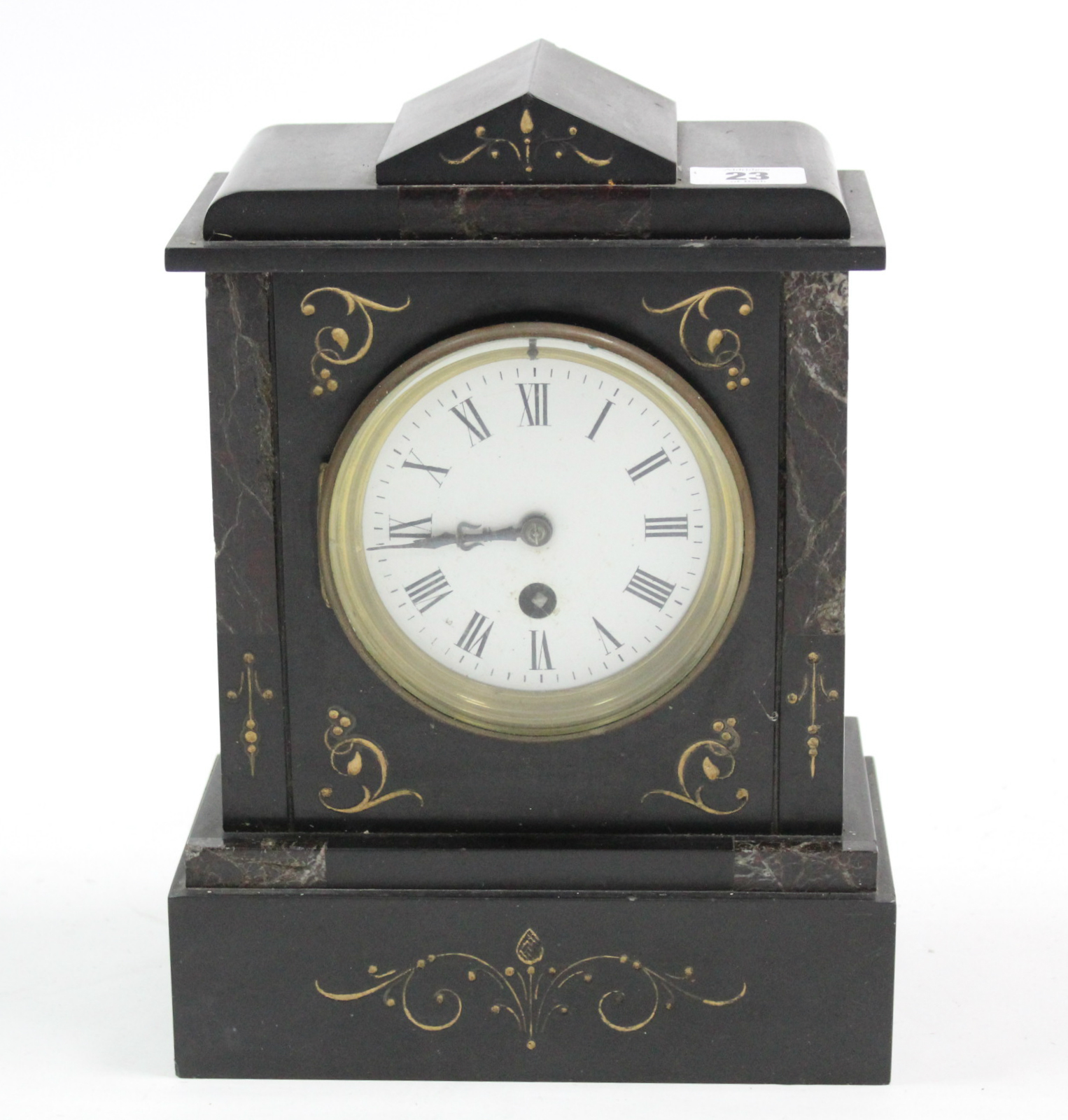 A Victorian mantel timepiece with black roman numerals to the white enamel dial, & in black slate