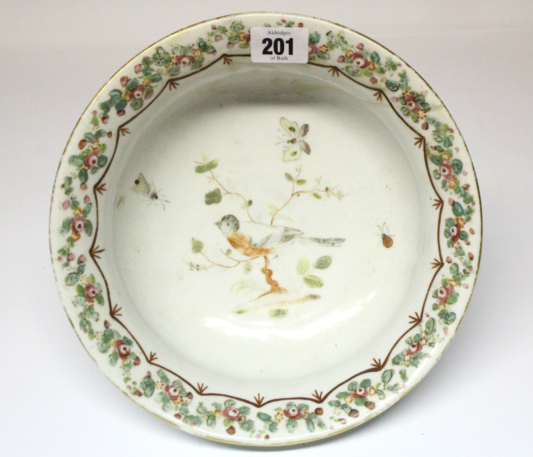 A 19th century Meissen porcelain circular bowl with painted bird design to centre & with floral