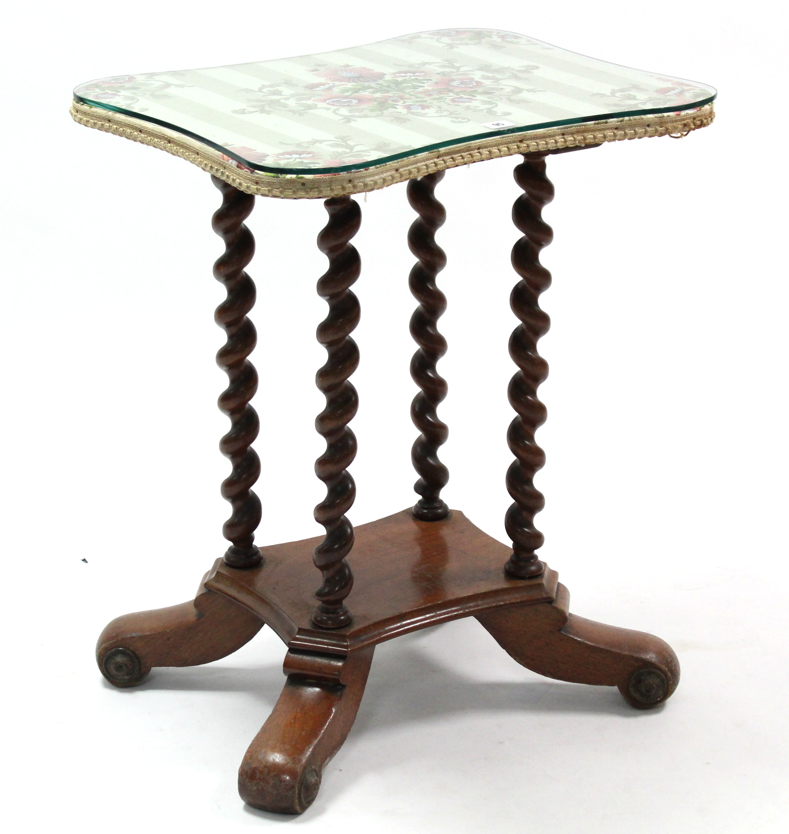 A Victorian mahogany occasional table with shaped rectangular top, on four barley-twist legs with