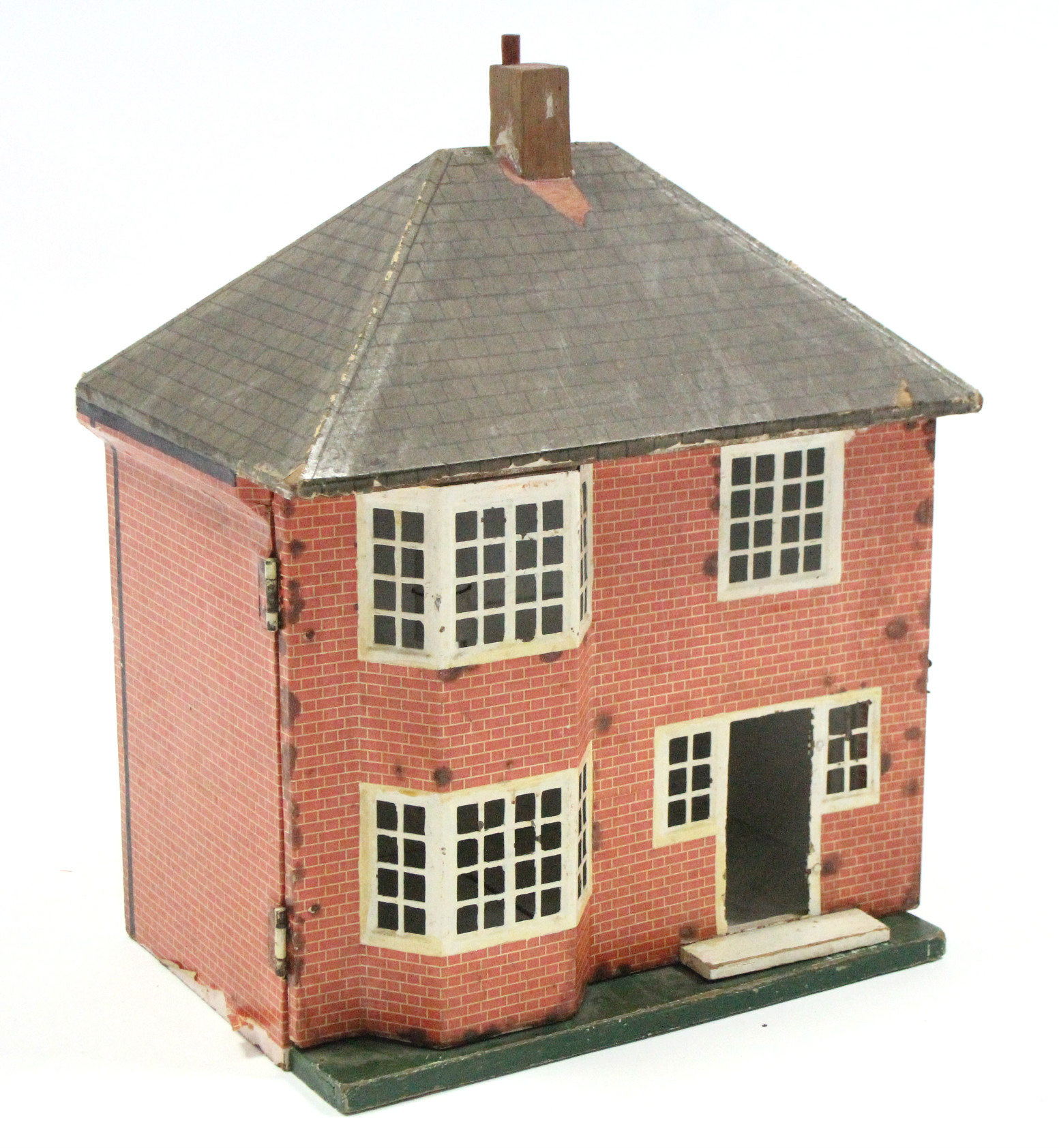 A mid-20th century paper-covered wooden two-storey doll’s house with opening front, 17¼” wide x