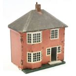 A mid-20th century paper-covered wooden two-storey doll’s house with opening front, 17¼” wide x