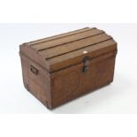 A grained tin domed-top travelling trunk with hinged lift-lid & with wrought-iron side handles, 29¼”