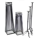 Two black-finish wrought-iron plant stands, each with granite top, 51¾”, & 36” high; & a similar set