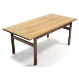 A rosewood-finish low coffee table with rectangular top, & on square legs with plain stretchers, 48”