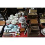 A Royal Albert bone china “Highland Thistle” pattern twenty-one piece tea service; six wooden