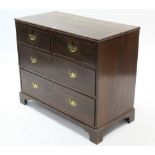 A Georgian inlaid-oak low chest fitted two short & two long graduated drawers with brass wing