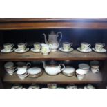 A Royal Albert bone china floral decorated fourteen piece part coffee service; a Wedgwood of Etruria