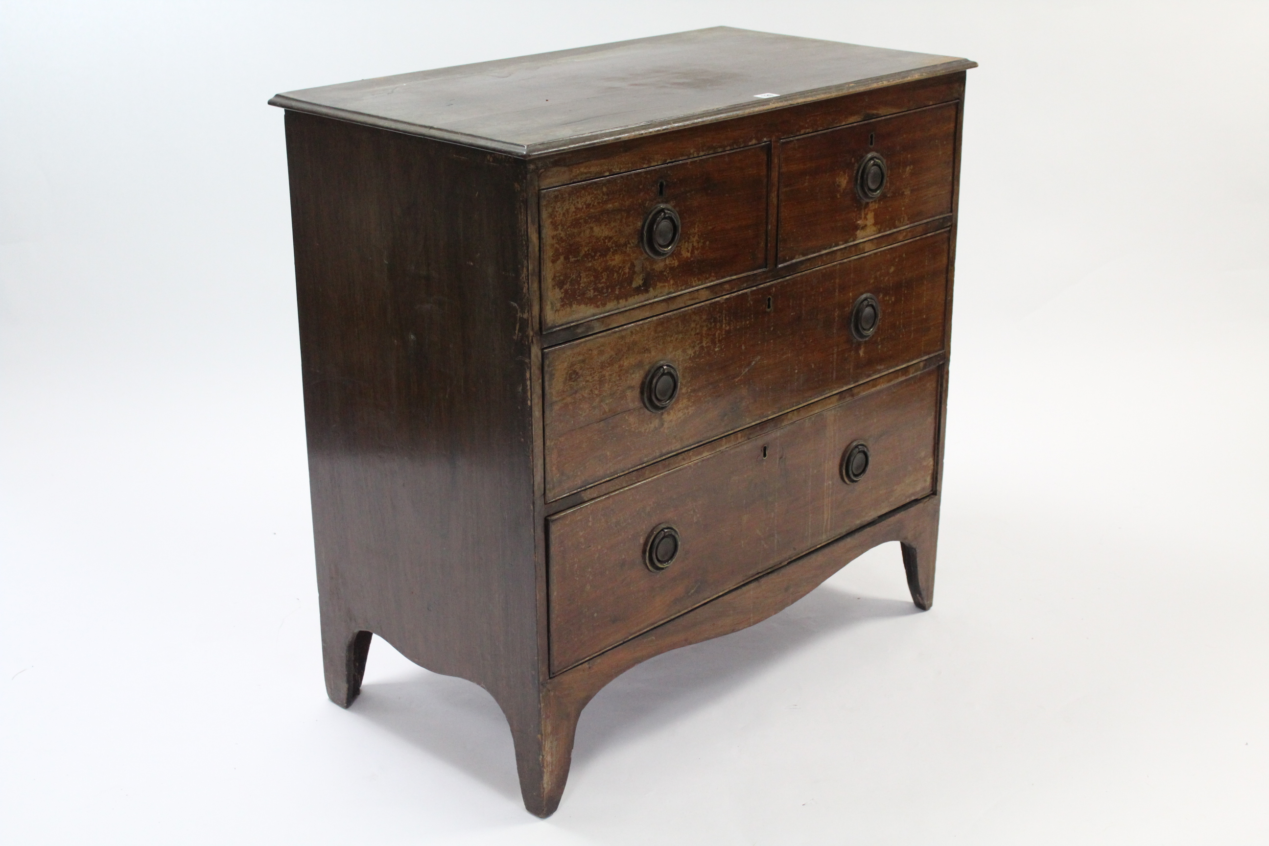 A Georgian inlaid-mahogany low chest fitted two short & three long graduated drawers with brass