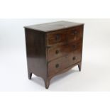 A Georgian inlaid-mahogany low chest fitted two short & three long graduated drawers with brass