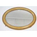 Three oval wall mirrors (various sizes); & various books & magazines.