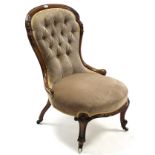 Another Victorian carved walnut frame nursing chair, with buttoned back & sprung seat upholstered