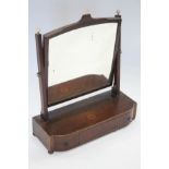 A regency inlaid mahogany rectangular swing toilet glass with turned ivory ball finials, the base