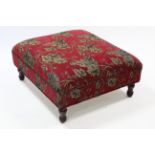 A reproduction large rectangular foot stool, upholstered crimson, black & grey foliate material, &