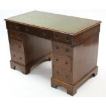A 19th CENTURY SMALL OAK PEDESTAL DESK, inset gilt-tooled green leather cloth, fitted with an