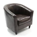 A brown leatherette tub-shaped chair.