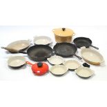 Ten various items of enamelled kitchenware.