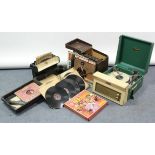 A Dansette portable record player in green & cream fibre-covered case; together with various