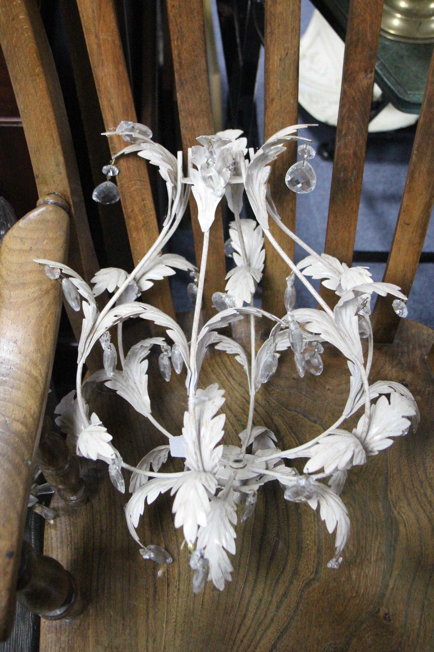 A cream finish wrought-metal eight-branch ceiling light fitting of foliate design, 22” wide x 32” - Image 2 of 4