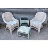A pair of white painted wicker conservatory chairs; a green-painted wicker conservatory table, & a