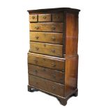 An 18th century mahogany chest-on-chest, the upper part with carvetto cornice & fluted canted