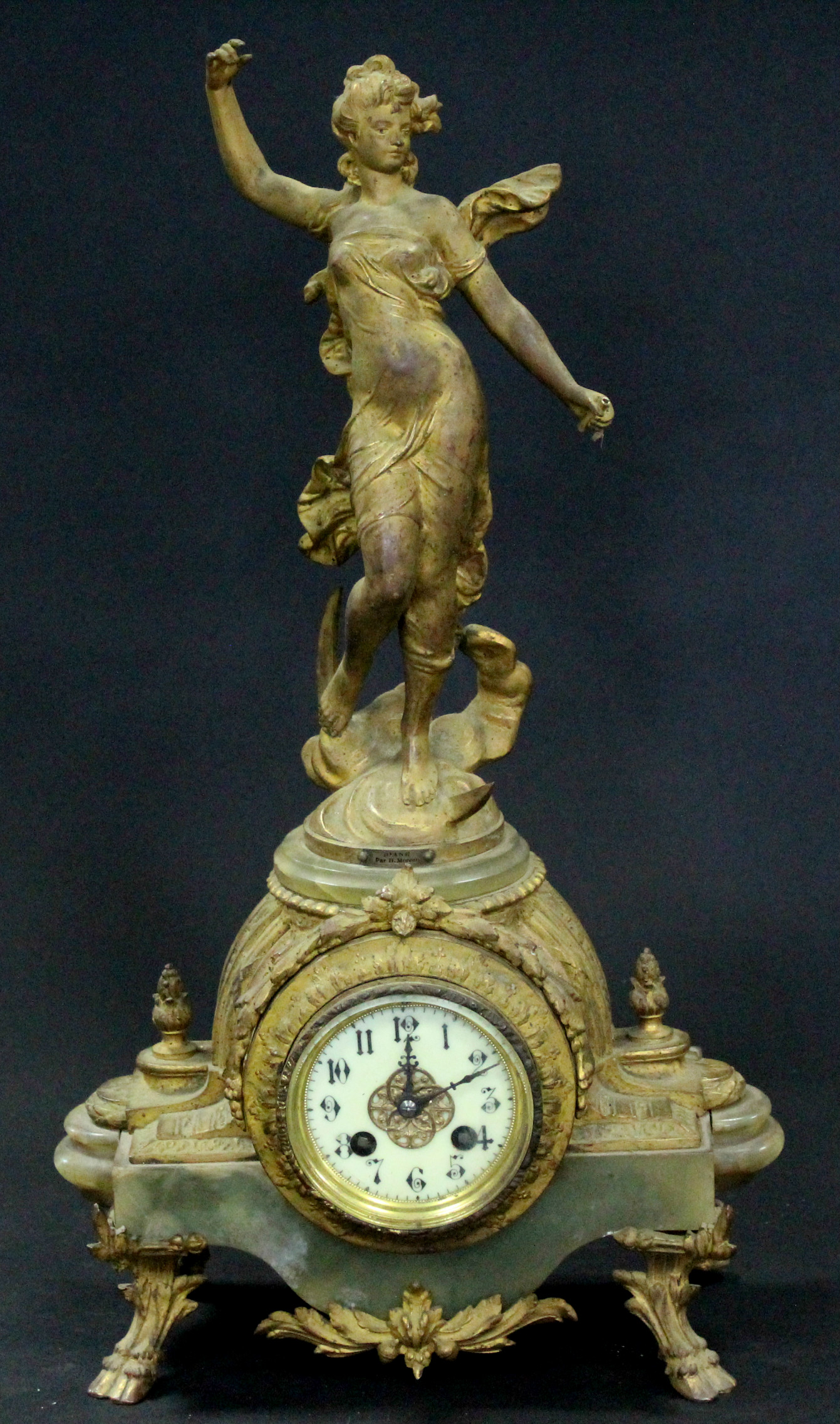A 19th century French mantel clock in gilt speltre & onyx case with classical female figure above