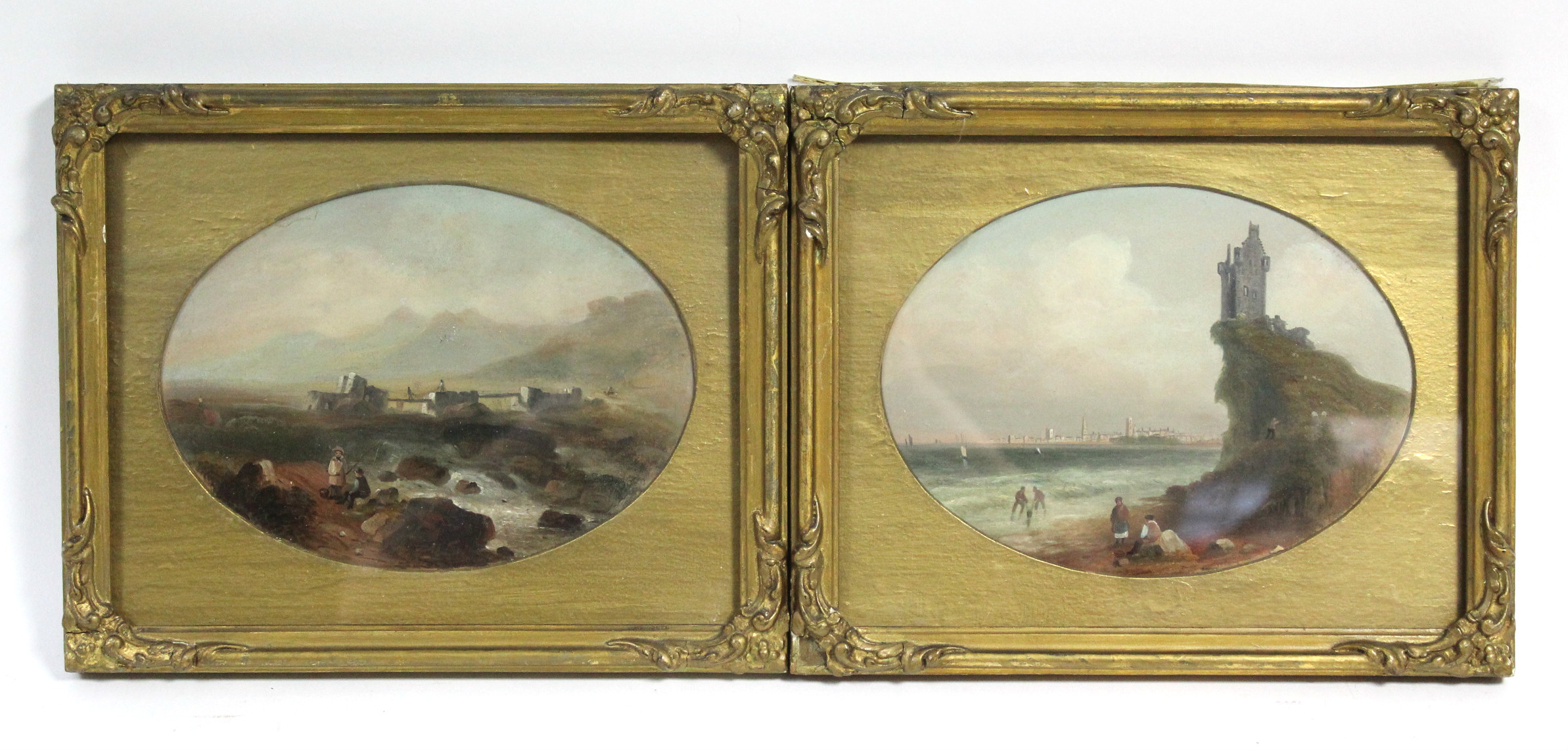 ENGLISH SCHOOL, mid-19th century. A coastal scene with cliff-top castle, figures on the beach, a