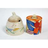 A CLARICE CLIFF “BERRIES” PATTERN PRESERVE POT, circa 1930-2, of cylindrical shape, with flat cover,