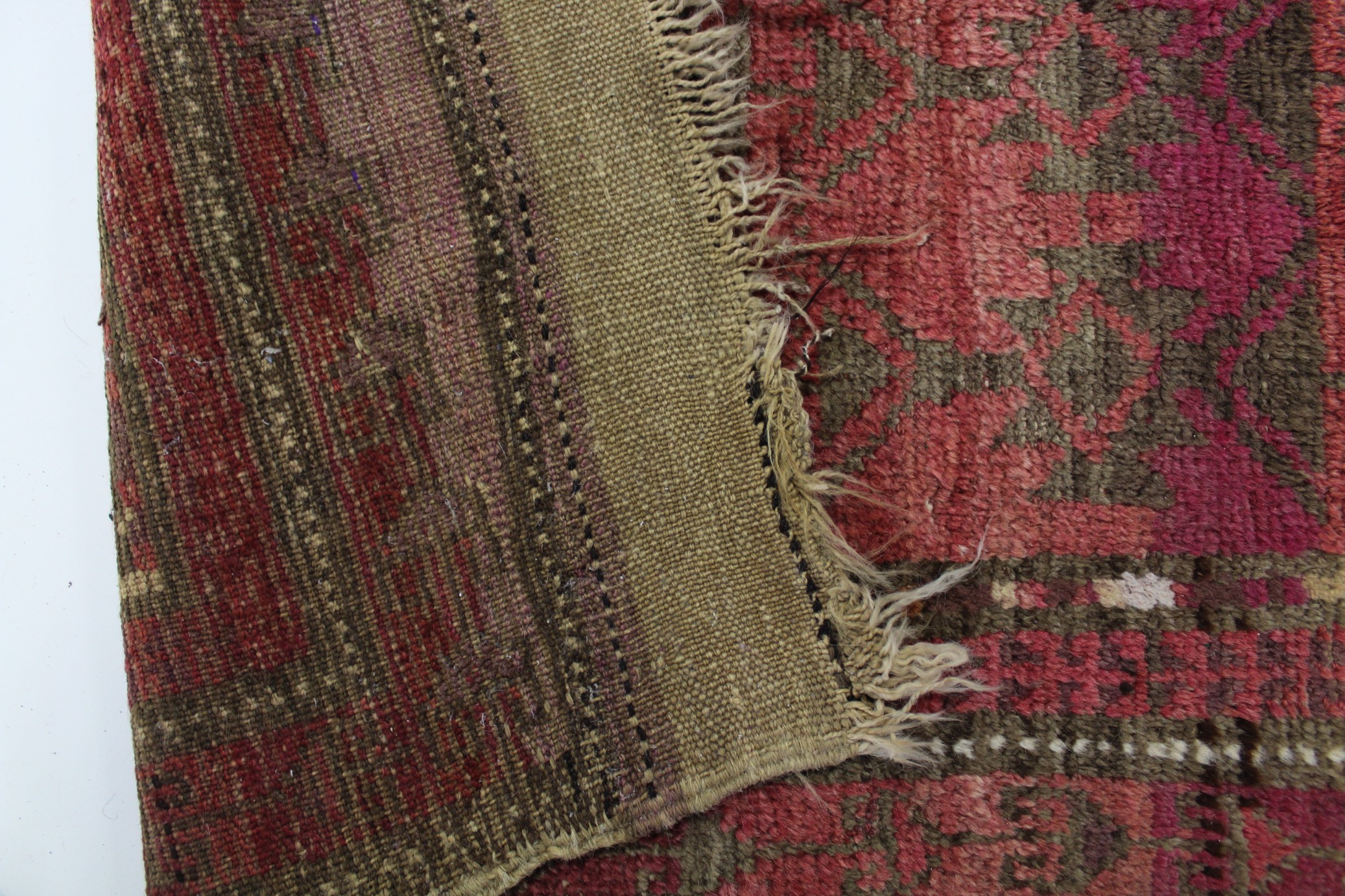 An antique Persian carpet of crimson ground, with all-over geometric design within multiple borders; - Image 2 of 2