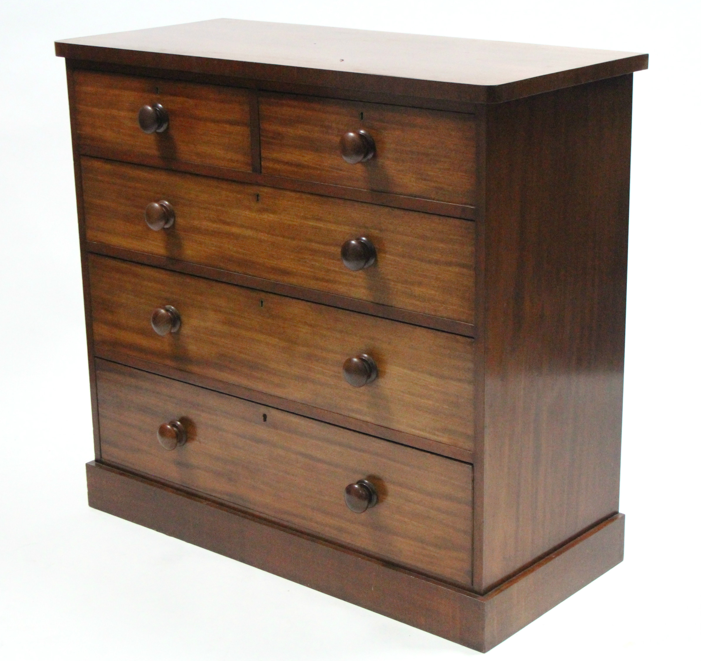 A Victorian mahogany chest fitted two short & three long graduated drawers with turned knob handles,