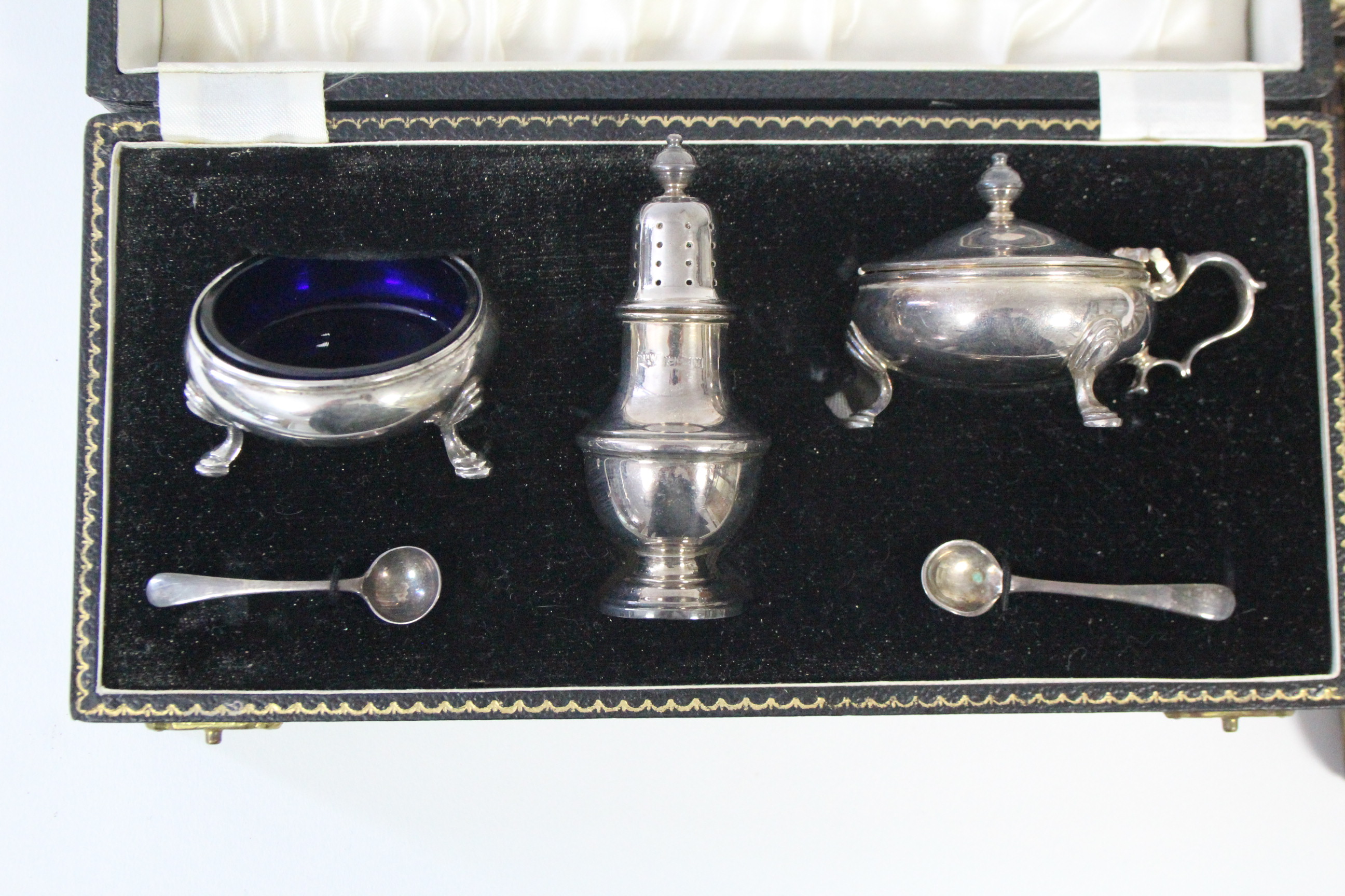 A three-piece silver condiment set comprising: a baluster pepper pot, a mustard pot, & a salt - Image 2 of 4