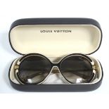 A pair of Louis Vuitton "Anthea" sunglasses, serial number: Z0427W; in original case.