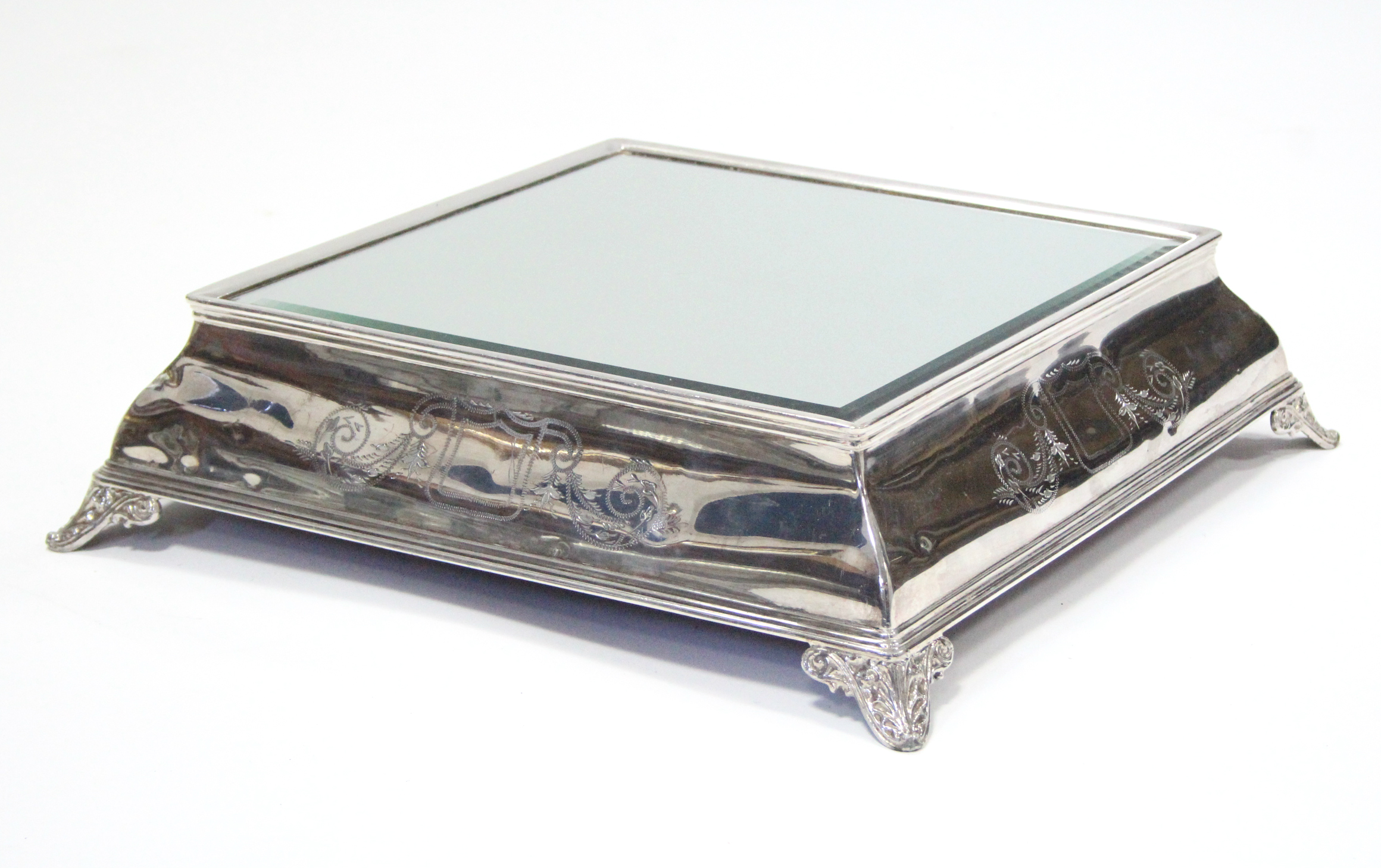 A LATE 19th/EARLY 20th century LARGE SQUARE CAKE STAND inset bevelled mirror plateau, the bombé