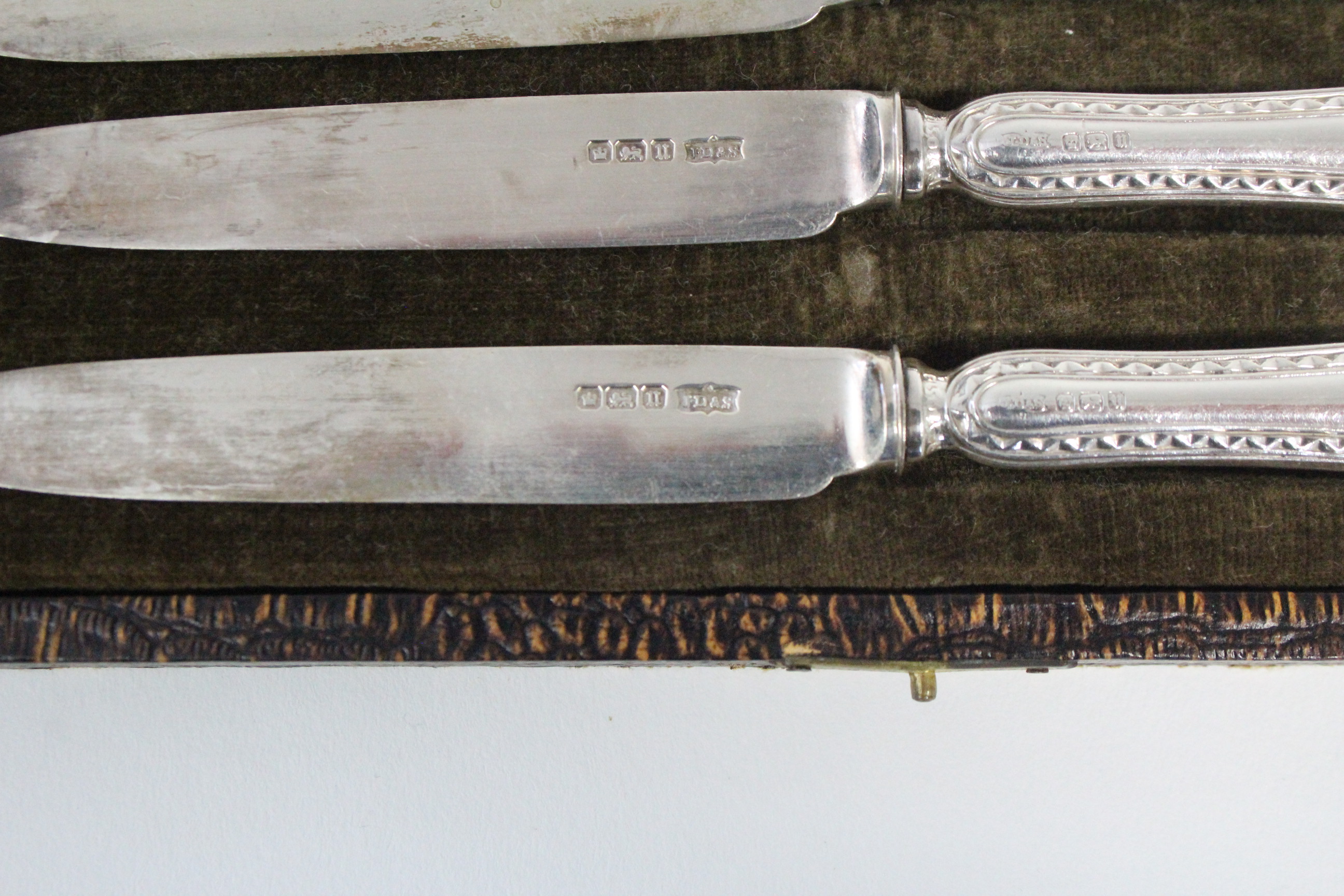 A three-piece silver condiment set comprising: a baluster pepper pot, a mustard pot, & a salt - Image 4 of 4