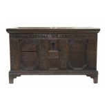 A LATE 17th/EARLY 18th century OAK COFFER, the carved panel front inscribed: “I.ANNA.CATRINA.