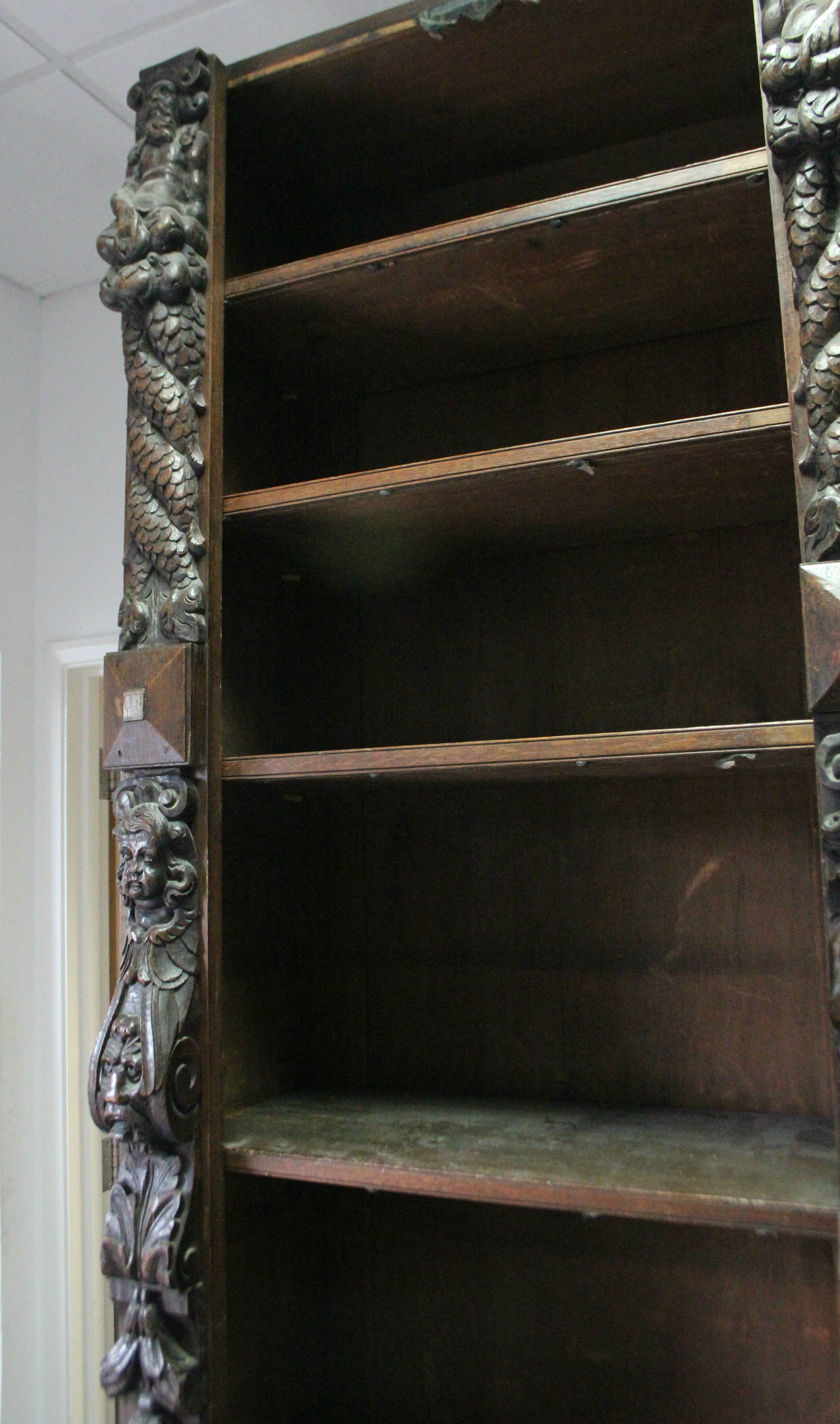 A Victorian oak tall standing open bookcase fitted fourteen adjustable shelves, and heavily carved - Image 3 of 7