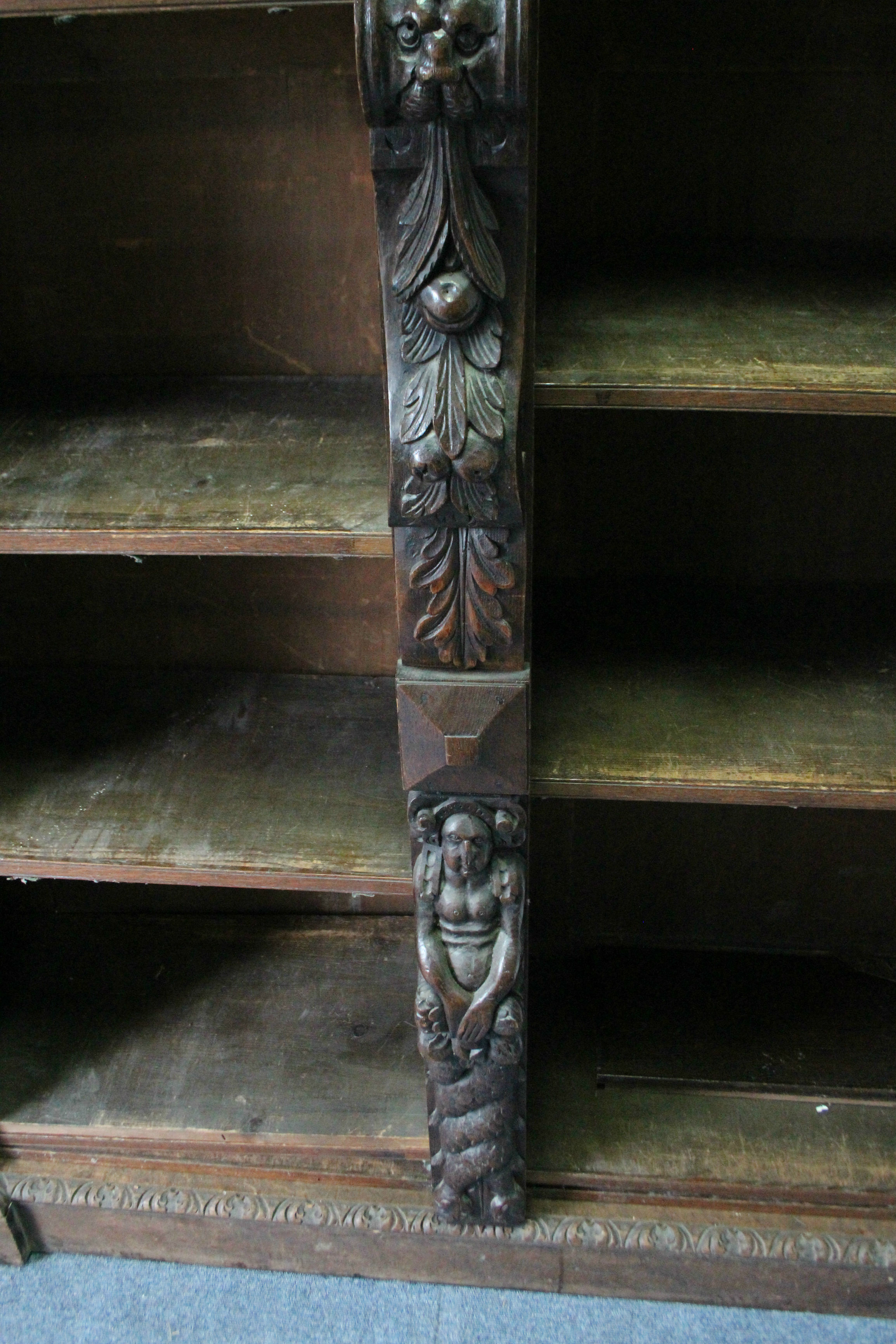 A Victorian oak tall standing open bookcase fitted fourteen adjustable shelves, and heavily carved - Image 6 of 7