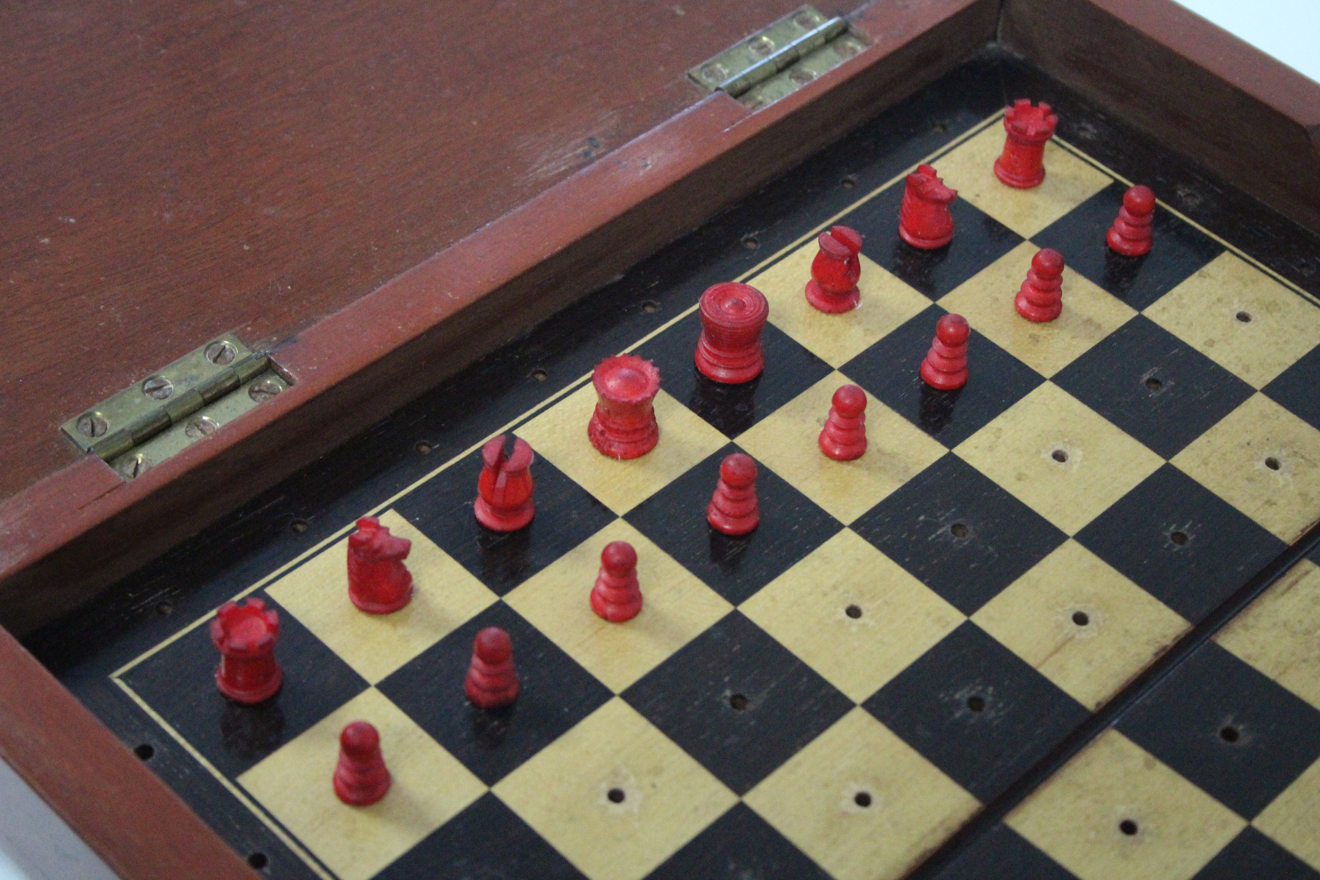 A late 19th century travelling ivory chess set of natural & red stain, height of Kings ½”, in - Image 3 of 5