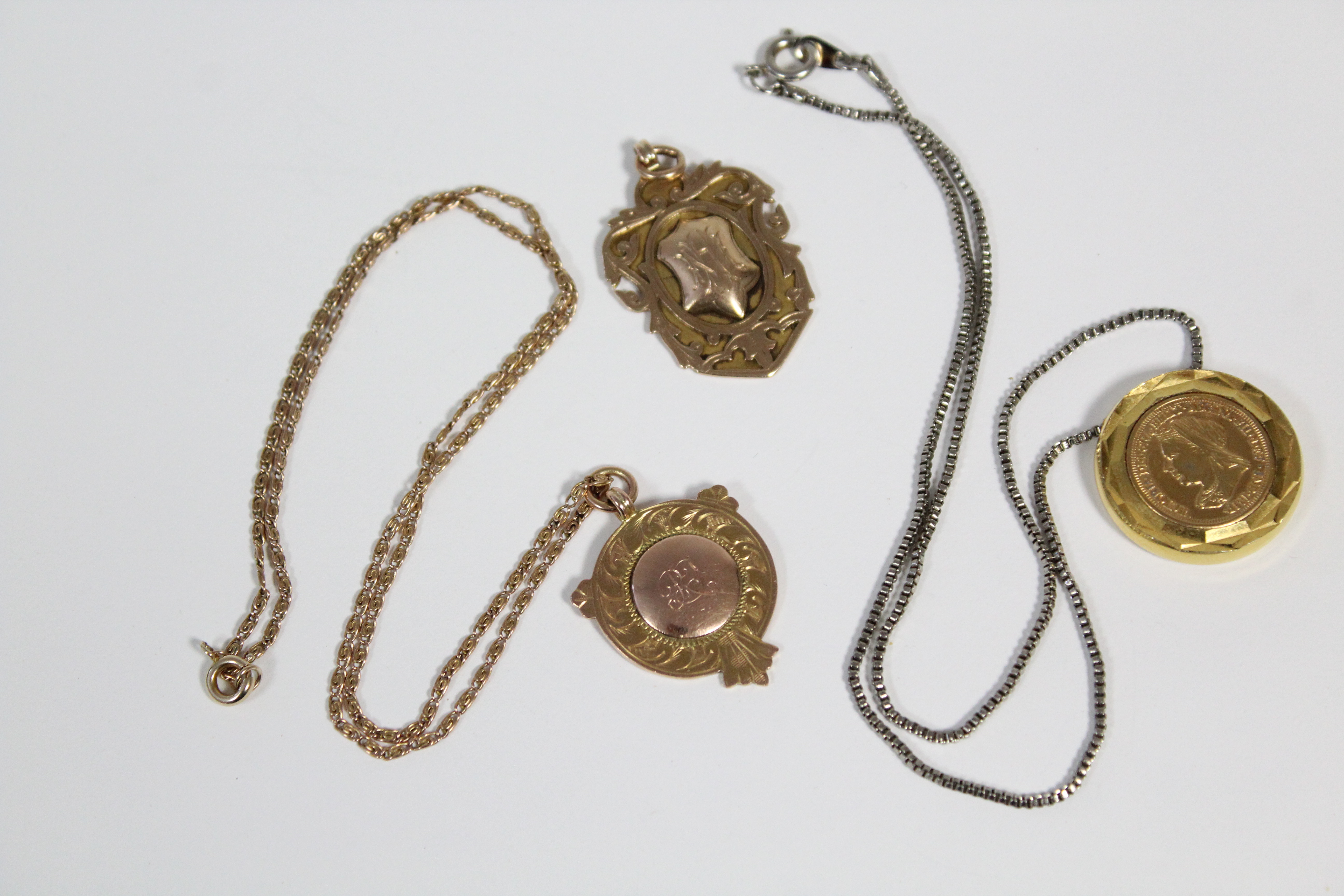 A yellow metal flat circular pendant inset facsimile Victorian half-sovereign; & two 9ct. gold - Image 3 of 3