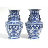 A pair of 19th century Chinese blue-&-white porcelain hexagonal baluster vases painted with