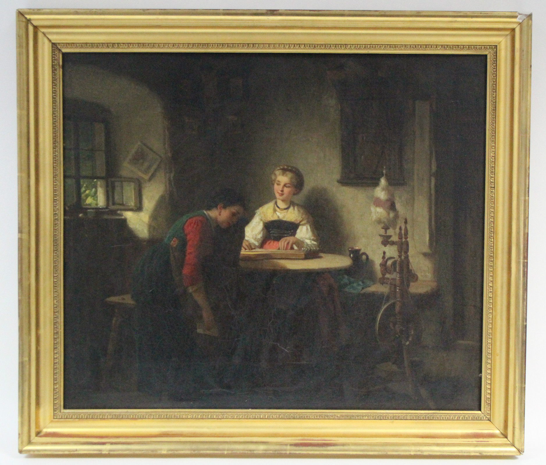 ENGLISH SCHOOL, 19th century. A room interior with two ladies seated at a table beside a spinning