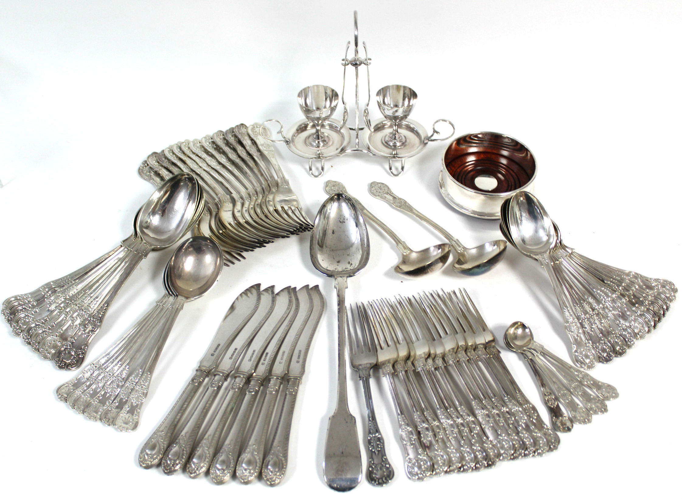 A part service of Queen's pattern flatware, comprising: eight table spoons, twelve table forks,