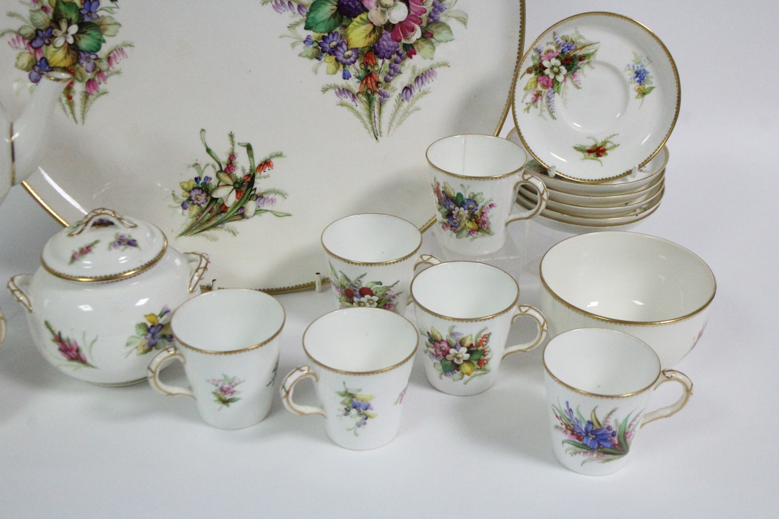 A ROYAL WORCESTER PORCELAIN TEA SERVICE with painted floral decoration on a white ground & with gilt - Image 5 of 6