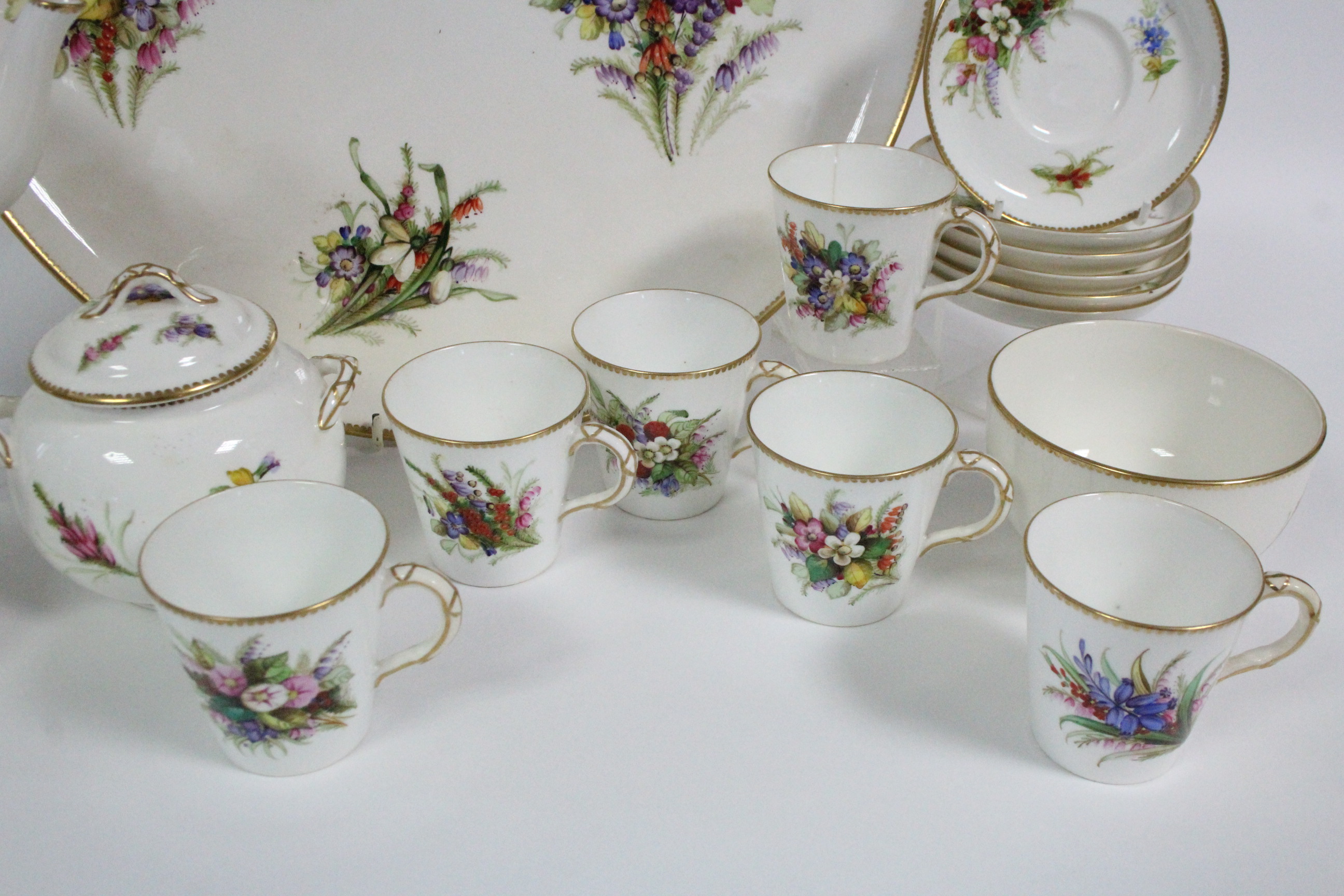 A ROYAL WORCESTER PORCELAIN TEA SERVICE with painted floral decoration on a white ground & with gilt - Image 4 of 6