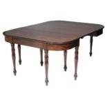 A regency mahogany ‘D-end’ extending dining table, with reeded edge & ebony stringing to the frieze,