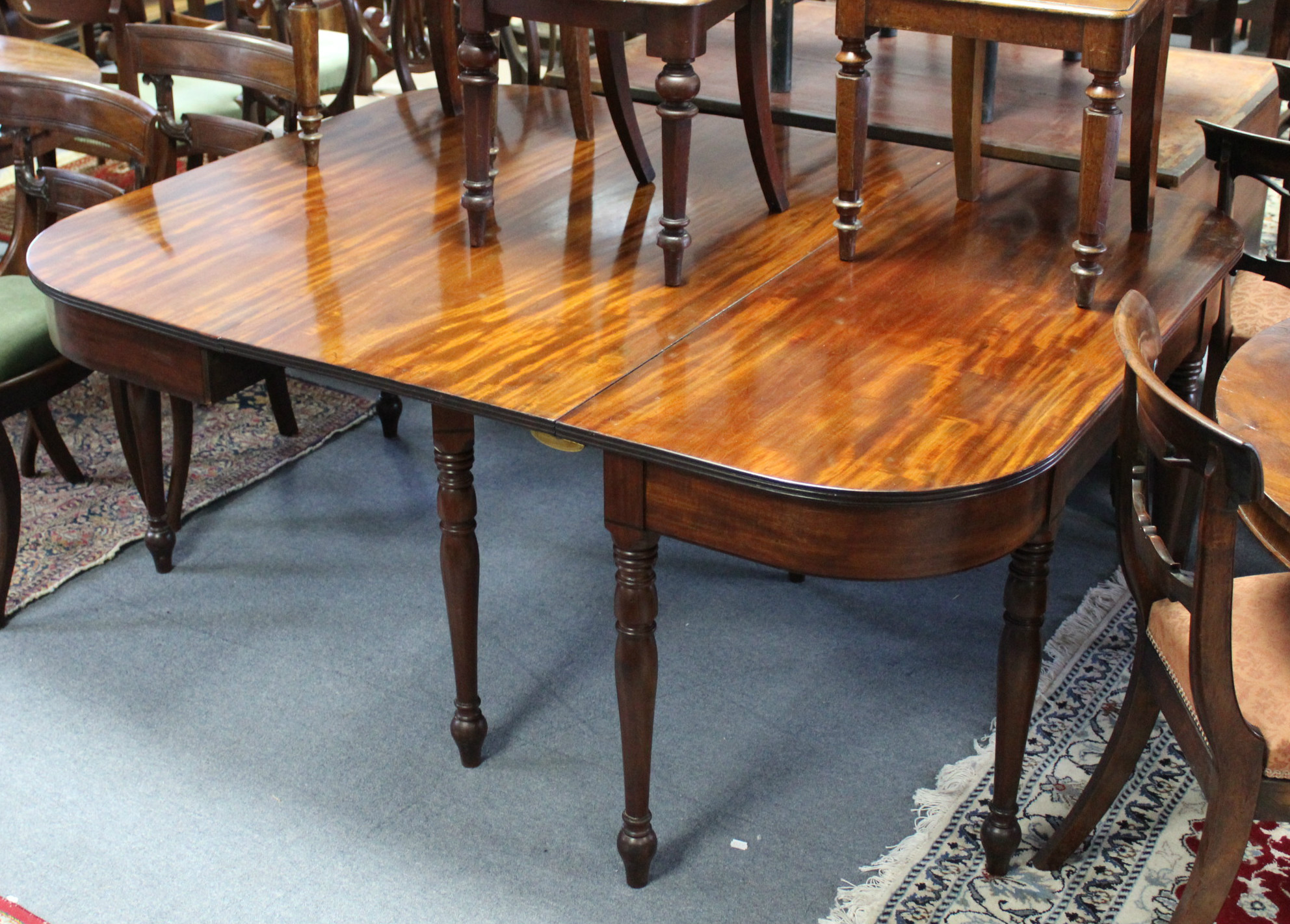 A regency mahogany ‘D-end’ extending dining table, with reeded edge & ebony stringing to the frieze, - Image 3 of 4