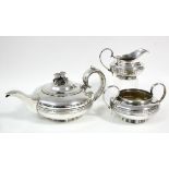 A WILLIAM IV SILVER THREE-PIECE TEA SET, of squat round form with waisted bands & scroll handles,