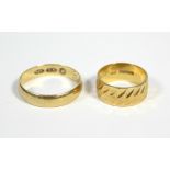 An 18ct. gold engraved band (5.3gm); & a 14ct. plain ditto (3.5gm).